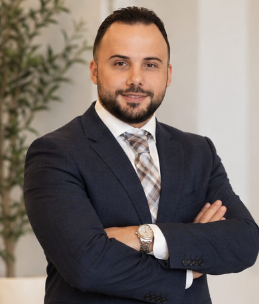Moe Kheireddine in a navy suit